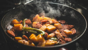 cooking a dish in a shallow pan